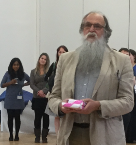 Peter Mack, being presented with books as his tenure as Honorary Chair of the SRS comes to an end at the biennial conference in Glasgow.